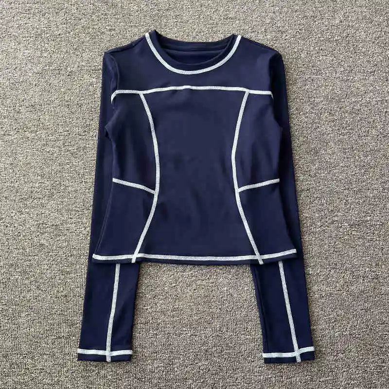 Curved yoga clothing for women; long-sleeved training tops that are quick-drying, slimming, and fashionable; suitable for runnin