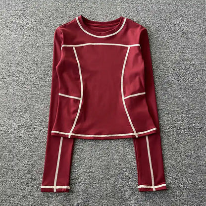 Curved yoga clothing for women; long-sleeved training tops that are quick-drying, slimming, and fashionable; suitable for runnin