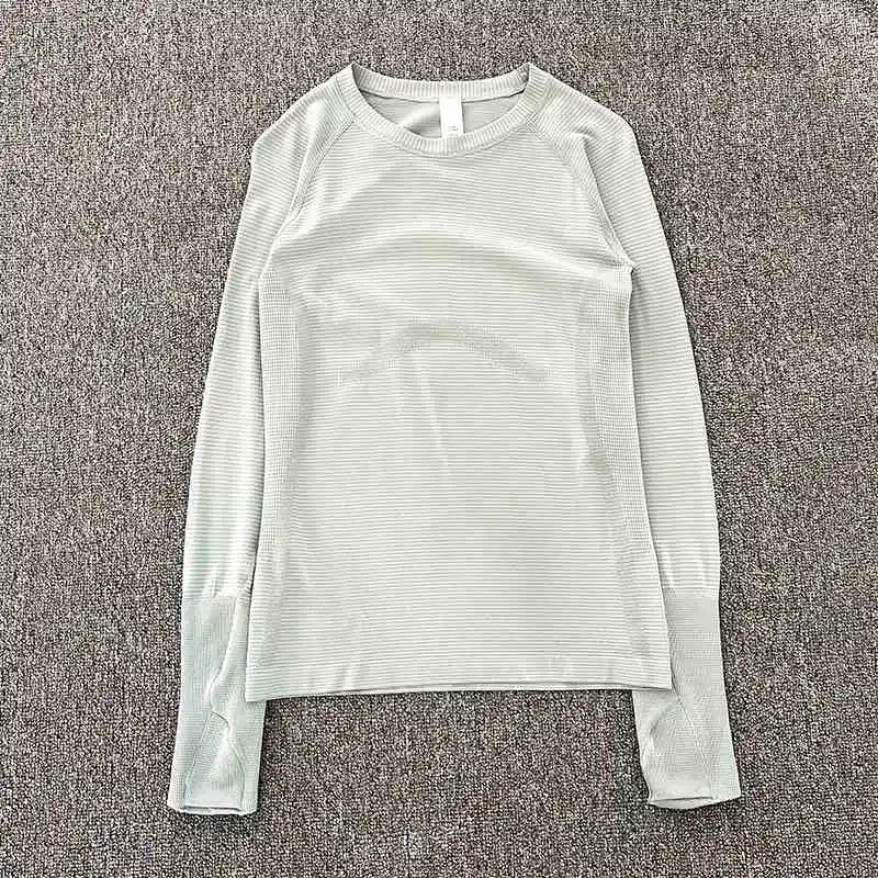 Yoga clothing top for women in spring and autumn, slim fit, long sleeved, running, Pilates training, fitness clothing