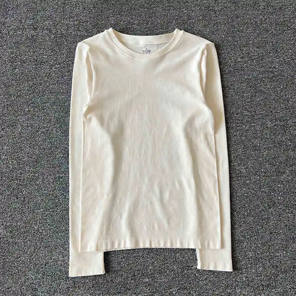 New autumn and winter yoga clothes nude solid color long sleeved women's quick drying running training Pilates sports slimming t