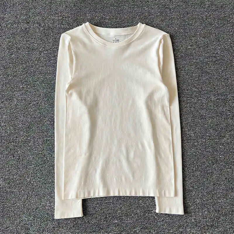 New autumn and winter yoga clothes nude solid color long sleeved women's quick drying running training Pilates sports slimming t