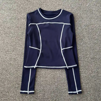 Curved yoga clothing for women; long-sleeved training tops that are quick-drying, slimming, and fashionable; suitable for runnin