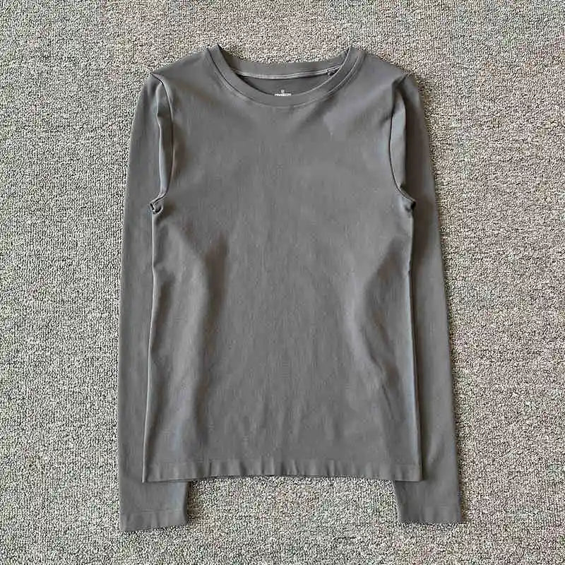 New autumn and winter yoga clothes nude solid color long sleeved women's quick drying running training Pilates sports slimming t